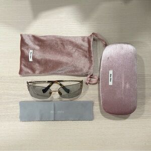 Miu Miu Sunglasses - Gold Frame with Gray Lenses